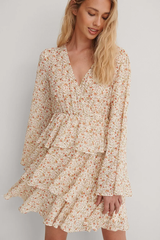 Elegant White Crepe Floral Dress with Flutter Sleeves & Layered Flounce